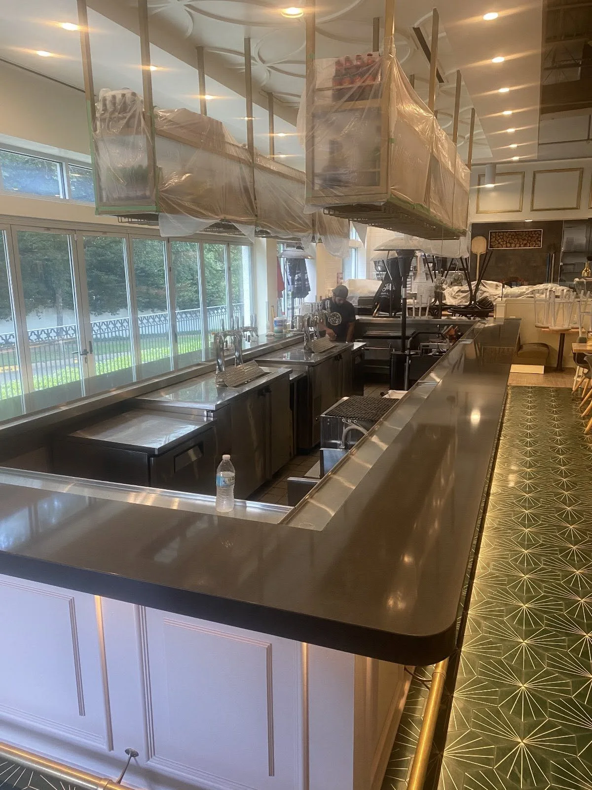 Dark quartz bar top with a bullnosed edge — Commercial